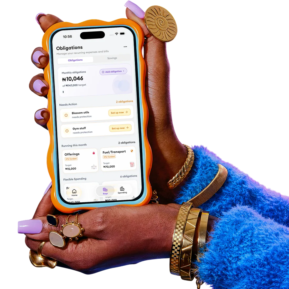 Hands holding a phone running Balancc’s Obligations screen - monthly obligations, targets, and spending categories